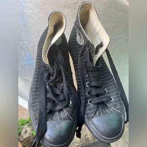 Converse high tops. Black and white pin stripes. Women’s 9, Men’s 7.